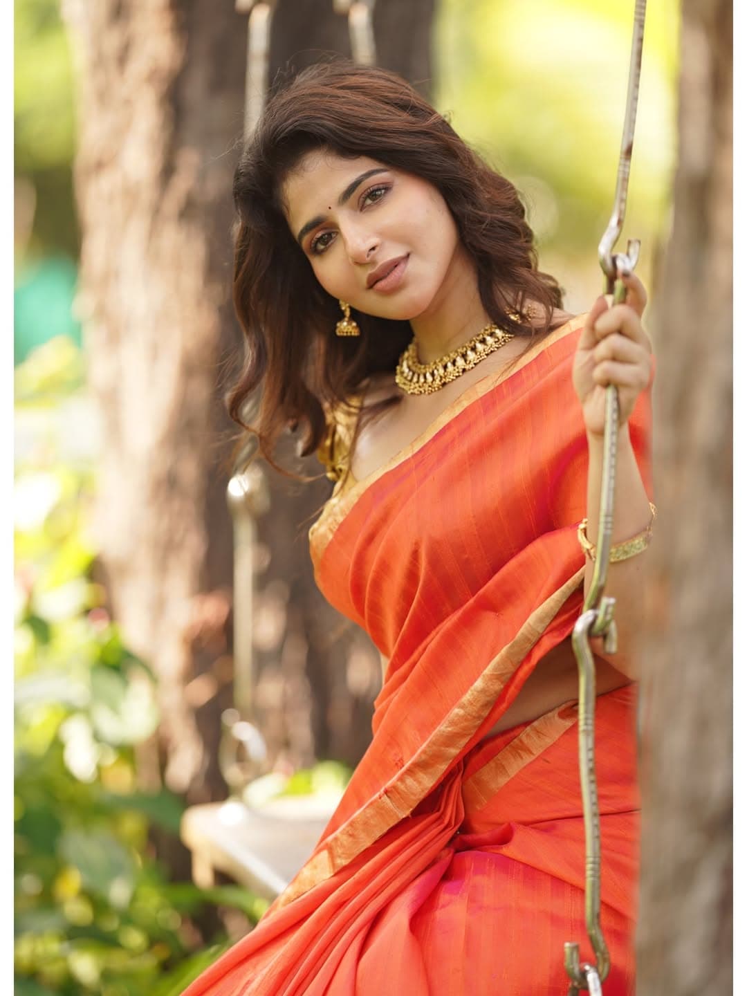 Heroine Aishwarya Menon Looks Beautiful In A Red Saree